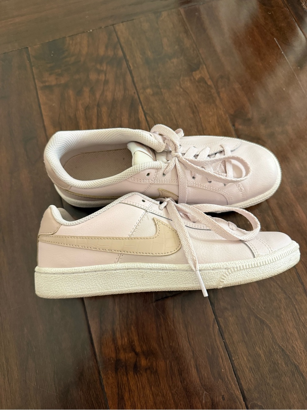 Nike Light Pink Low-Top Sneakers with Beige Swoosh